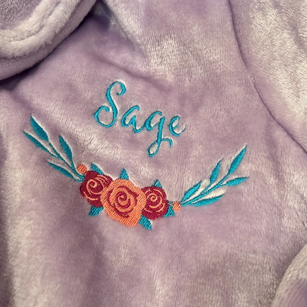NWOT Sage embroidered plush lilac robe is one size. Super soft.